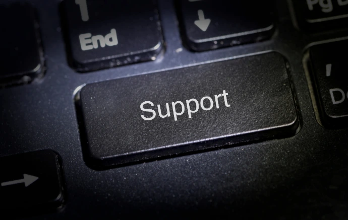 24/7 customer support and technical assistance keyboard key for SaaS platforms.